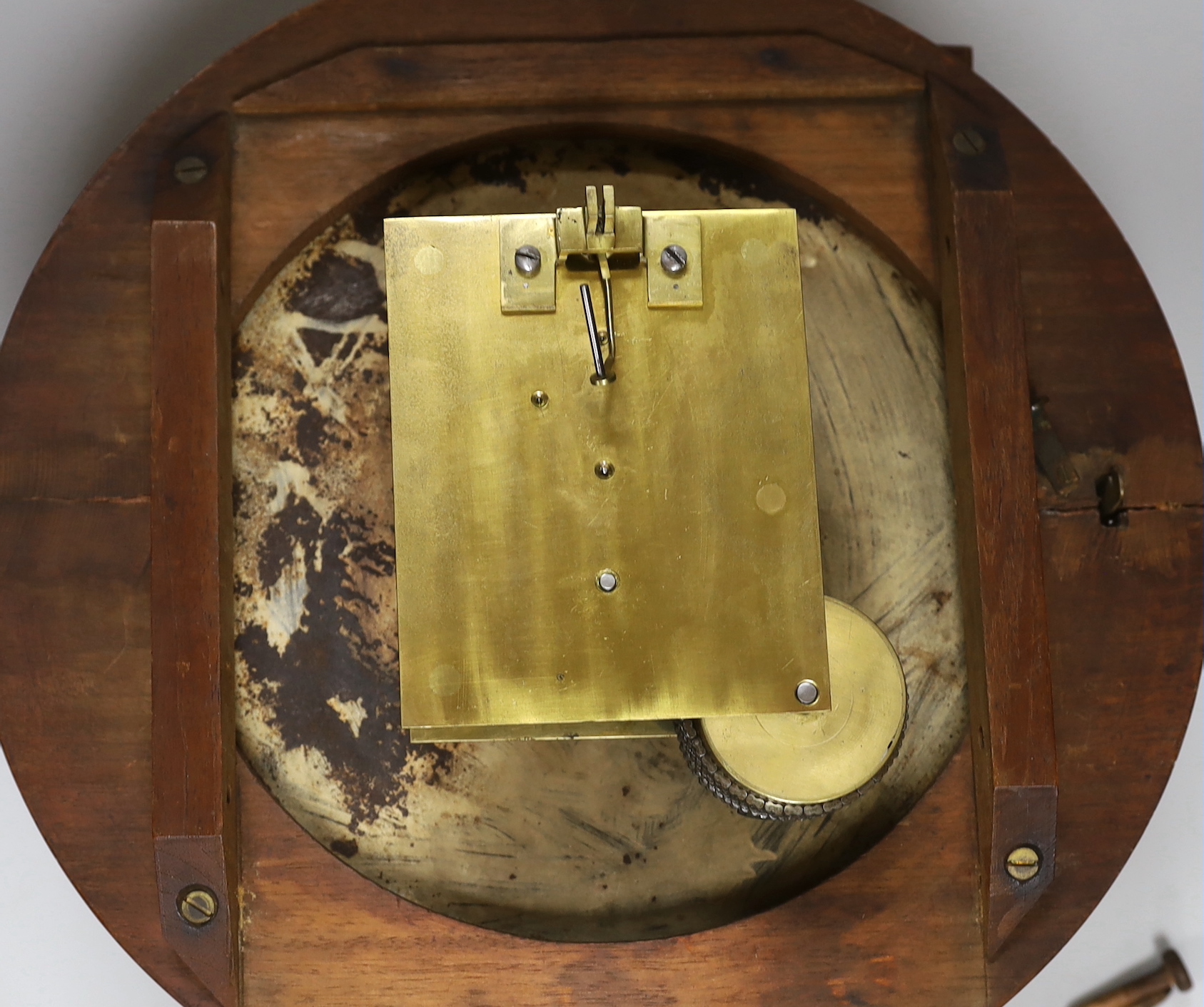 A late Victorian mahogany dial clock, 37cm diameter